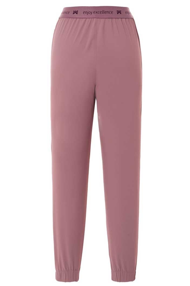 Pantalón de mujer rosa tipo jogging tejido técnico